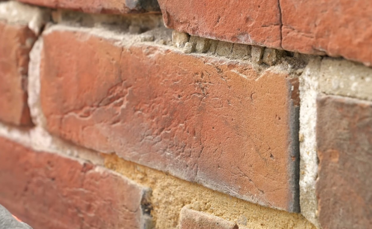 Brick and stone steps repair showing detailed brick texture and craftsmanship